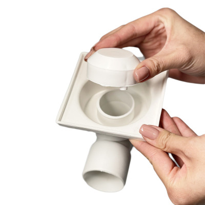 Будкрам купити Душовий трап 10х10 см, горизонтальний вихід DN50, гідрозатвор, пластикова решітка Maxiflow