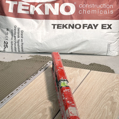 Будкрам купить Клей для керамической плитки Teknofay EX C2TE, тиксотропный, повышенной прочности, серый, 25 кг TEKNO Клей для керамической плитки Teknofay EX C2TE, тиксотропный, повышенной прочности, серый, 25 кг TEKNO 3